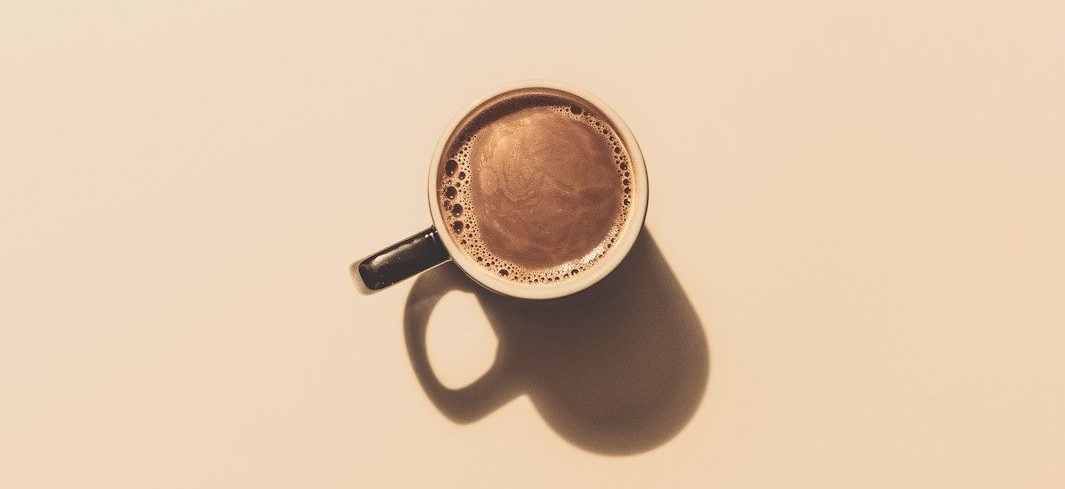 brown ceramic teacup
